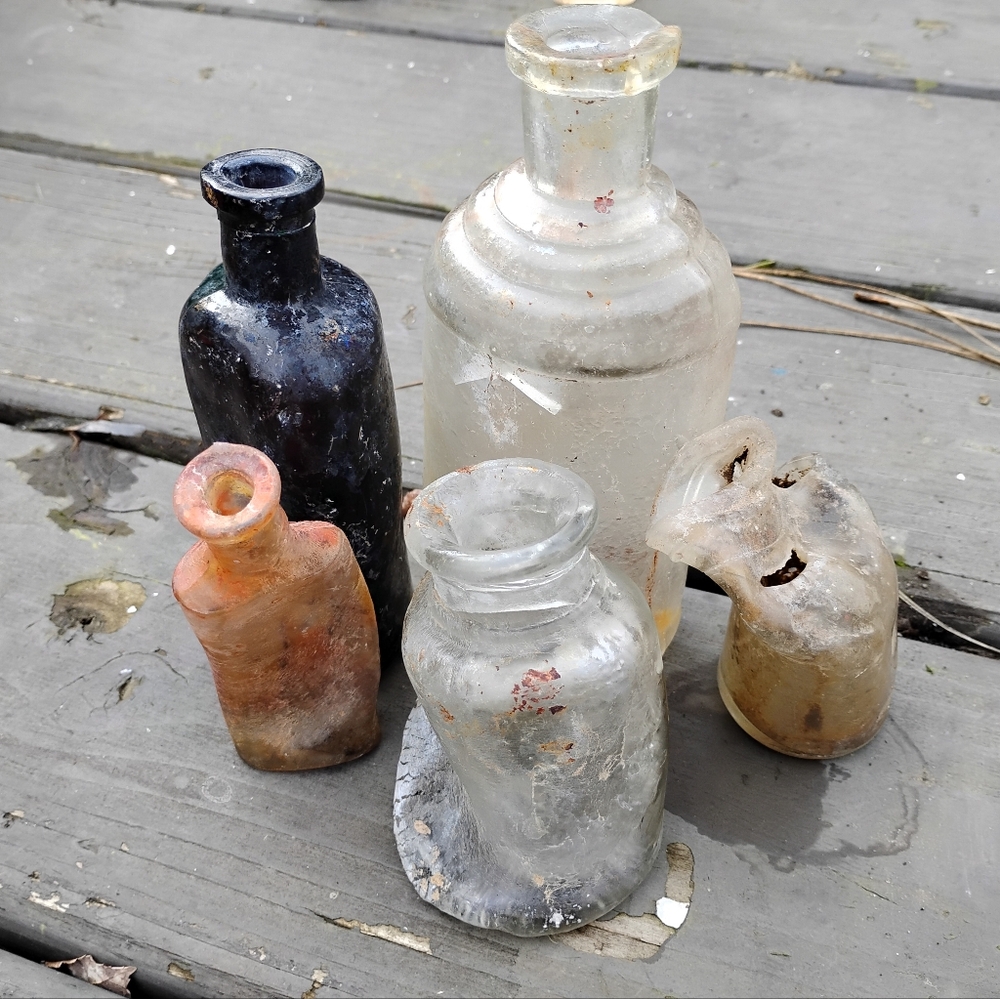 Vintage melted bottles
